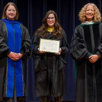 Provost and Christine posing with Awardee